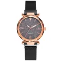 Elegante Damenuhr mit Sternenhimmel-Zifferblatt und schwarzem Milanaise-Magnetarmband - Schwarz