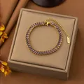 Elegant gold-plated stainless steel bracelet featuring purple baguette zirconia crystals - Purple Zircon / Gold