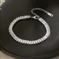 Elegant stainless steel tennis bracelet with baguette-cut clear cubic zirconia stones - White Zircon / Steel