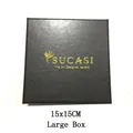 Detail view of a large 15x15cm black jewelry packaging box featuring a gold logo - Black Jewelry Box Set; As Pictured