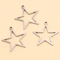 Vue rapprochée de pendentifs en forme d'étoile en acier inoxydable pour bijoux DIY - Étoile (Grand) / 20X23X1.2mm / Acier