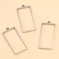 Vue détaillée de pendentifs rectangulaires en acier inoxydable pour création de bijoux DIY. - Rectangle-Grand / 13X27X1.2mm / Acier
