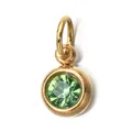 Macro view of a round gold-plated stainless steel pendant with a green faceted birthstone - August Birthstone (6mm)