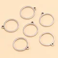 Vue détaillée des cadres de pendentif circulaires en acier inoxydable pour bijoux DIY - Rond - Petit / 12X13X1.2mm / Acier