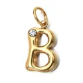 Close-up of gold stainless steel letter B charm with a clear sparkling birthstone - Letter B