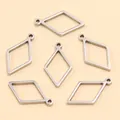 Vue détaillée de breloques géométriques en losange en acier inoxydable argenté pour bijoux - Forme de Losange - Petit / 9X17X1.2mm / Acier
