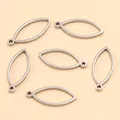 Vue détaillée de cadres géométriques en acier inoxydable en forme de feuille pour bijoux - Forme Marquise - Petit / 7X18X1.2mm / Acier