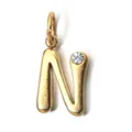 Detailed close-up of a gold-plated letter N pendant with a sparkling birthstone. - Letter N