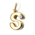 Detailed macro view of the gold-colored stainless steel initial S pendant with stone - Letter S