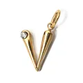 Macro view of a gold-plated stainless steel letter V pendant with a clear birthstone - Letter V