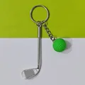 Zilveren metalen golfclub en groene golfbal sleutelhanger hanger accessoire voor tassen - 7.8*2.6cm, 17.8g / Groen