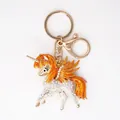 Funkelnder Einhorn Schlüsselanhänger aus Metall mit orangefarbenen Flügeln und Strass - Orange