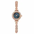 Elegante Damenuhr in Roségold mit Strasssteinen, dünnem Armband und blauem Zifferblatt. - Roségold Gehäuse Blaues Zifferblatt