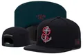 Stylish black snapback cap featuring embroidered anchor and snake design detail. - Style-122 / Adjustable