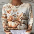 Detaillierte Nahaufnahme des herbstlichen Kürbis- und Ahornblatt-Digitaldrucks auf Strickpullover - JSTGI-53476711 / S