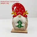 Detailed view of a wooden Christmas gnome ornament with a white beard and red hat. - Red Polka Dot Hat Antler With Xmas Tree Ornament