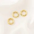 Dettaglio macro di tre chiusure a molla tonde placcate oro 14K per creazione gioielli fai da te - Fibbia a Molla Tonda (12mm) / 1 Pezzo / Oro 18K