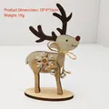 Detailed view of handcrafted wooden reindeer ornament with bells and bow - Natural Wood Color Reindeer Ornament