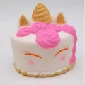 Squishy licorne gâteau rose et blanc, jouet anti-stress à mémoire de forme - Gâteau Licorne à Bord Doré et Corne Dorée / Or