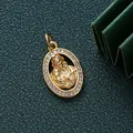 Detailed view of a gold-plated oval pendant featuring cubic zirconia and goddess relief. - Goddess Arch (QC707) / 17.5x11.3mm / Gold