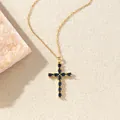 Elegante goldene Kreuzkette mit markise-geschliffenen blauen Zirkonia-Steinen im Detail - C00184 / 18K-Gold