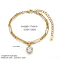Detailed view of gold paperclip chain bracelet with a heart-shaped cubic zirconia pendant - Heart Pendant Style (SL110) / Gold