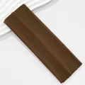 Macro view of a 7cm wide coffee brown elastic sports headband with soft knit texture - Coffee