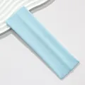 Detailed view of the premium light blue 7cm wide elastic sports headband for yoga - Light Blue