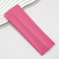 Close-up view of a rose pink 7CM wide high-elasticity sports headband with knit texture - Pink