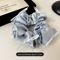 Coletero de satén azul claro estilo balletcore con delicados lazos de cinta blanca elegante - Estilo Cinta (Diámetro Aprox. 13,5 cm) / Azul