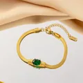 Elegantes vergoldetes Titanstahl-Schlangenarmband mit grünem ovalem Edelstein Armschmuck - Grüner Strass Armband (Gold)