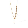 Detailed macro view of gold titanium steel necklace featuring 6mm clear cubic zirconia stones - 8-Stone Rhinestone Necklace / 8-Stone Rhinestone Necklace