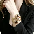 Vintage gold cuff bracelet with brown stone and geometric layered design for women - Brown With Staggered Cutouts
