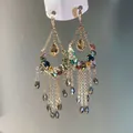 Bohemian long tassel earrings featuring colorful crystal beads and gold-tone chains for women - Ear Hook - Gold - Tassel