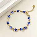 Detailed view of vintage gold-plated evil eye bracelet with blue bead charms - F-wlb0110-02-dark Blue