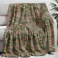 Detailed view of a bohemian paisley floral print fleece throw blanket on a sofa - ALKJ12 / 75*100 [source Factory]
