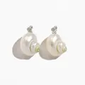 Detailed view of natural white conch shell earrings featuring pearlescent luster and silver studs - Stud Earrings (H9058B)