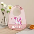 Pink waterproof silicone baby bib with cute unicorn illustration and large food catcher pocket - Pink Unicorn