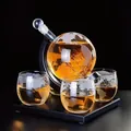 Detailed view of an etched globe whiskey decanter set with three matching glasses - 850ml Wine Bottle + Standard Wooden Stand + 4 X 250ml Bottles; Transparent
