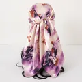 Detailed back view of a floral printed satin headwrap square scarf on a mannequin head - Purple Ink Floral