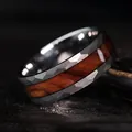 Professional close-up of a faceted stainless steel ring featuring a dark wood inlay - 7 / Faceted Edge Style / Steel Color Dark Red Wood Grain