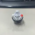 Simpatico giocattolo squishy antistress foca con lecca-lecca rossi e bianchi in base nera - Chef Foca Bianco (Con Lecca-lecca E Ciotola) / Bianco