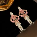 Creative pink rhinestone nutcracker soldier drop earrings with stylish enamel finish - Pink and White Style (WH2358-2)