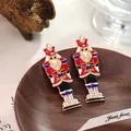 Enamel Nutcracker soldier drop earrings with sparkling crystals and vibrant colors - Red and Blue Painted Style (E32229-1)