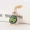 Glinsterende schildpad sleutelhanger met groene en witte kristallen, leuk cadeau voor tasbedels - Lake Green Emerald