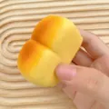 Langsam zurückfederndes Brot-Squishy-Spielzeug in Brötchenform zum Stressabbau in Gelb - Doppelt Verbundenes Brot
