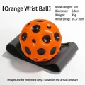 Palla rimbalzante arancione con cinturino da polso nero regolabile e corda elastica - Diametro 6.8cm / Arancione
