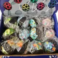 Set da 12 palline rimbalzanti da polso assortite con motivi di dinosauri e luna in scatola - Misura 6cm / Dinosauro Misto