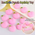 Un lot de jouets à presser mignons en forme de pêche rose pour soulager le stress - Pêche