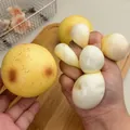Jouet de décompression réaliste en forme de pomme de terre jaune à texture fluide - Pomme de Terre Réaliste